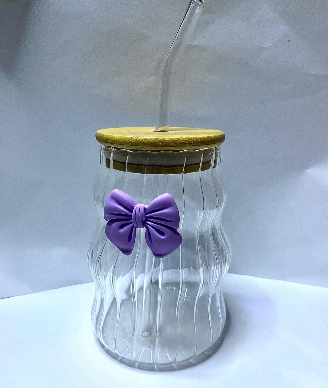 Elegant glass tumbler with bamboo lid and straw- purple bow design.