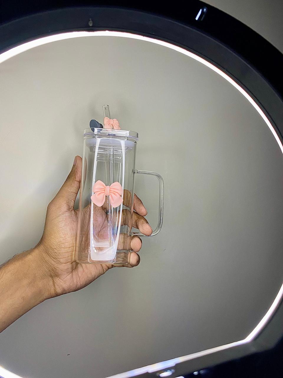 Aesthetic glass tumbler with pink bow.