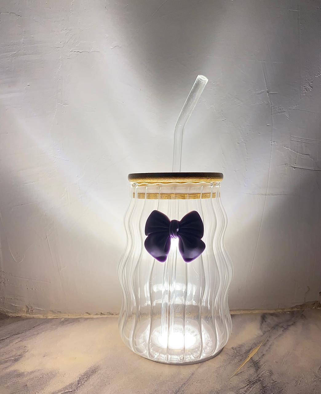 Elegant glass tumbler with bamboo lid and straw- purple bow design.